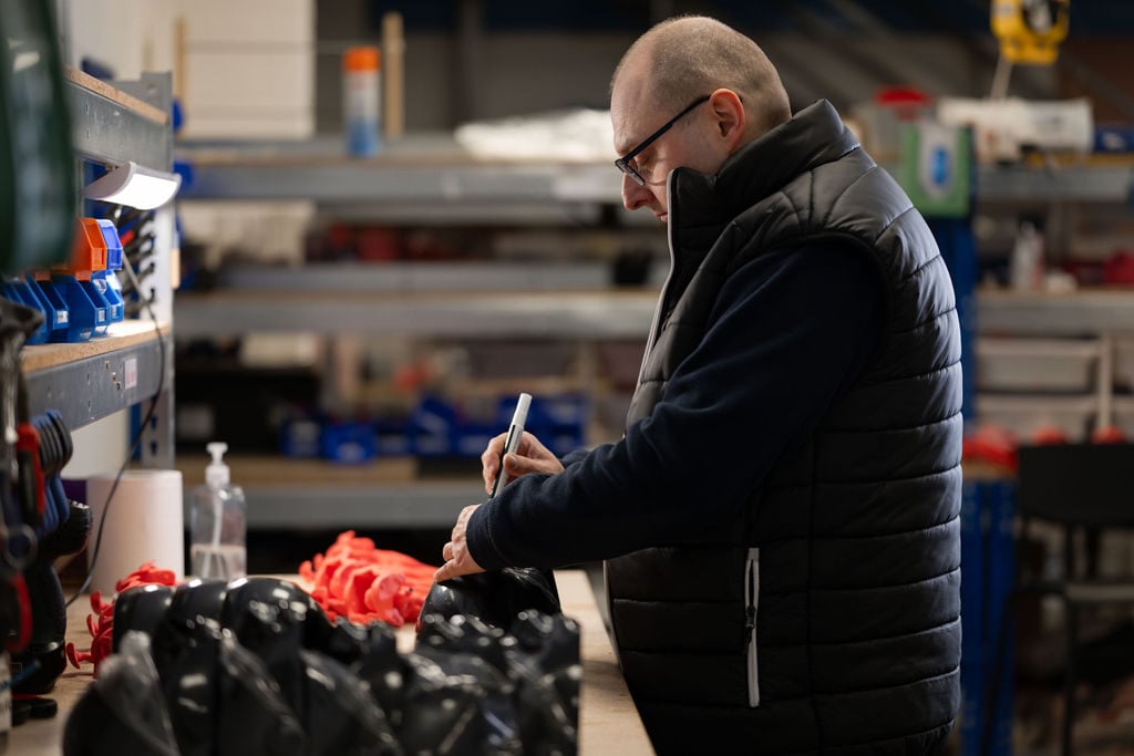 Member of Production team assembling a Trucorp Manikin